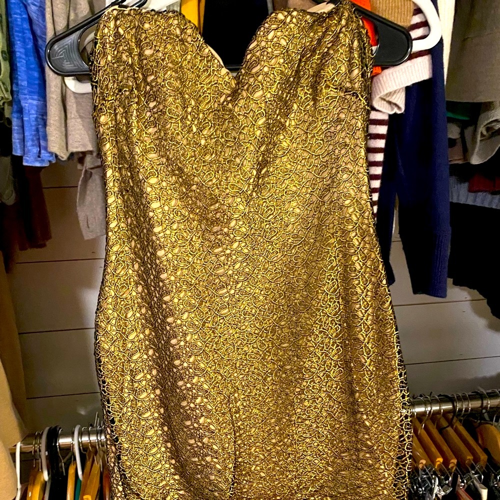 Small BEBE gold party dress. Hits upper thigh 5’5”